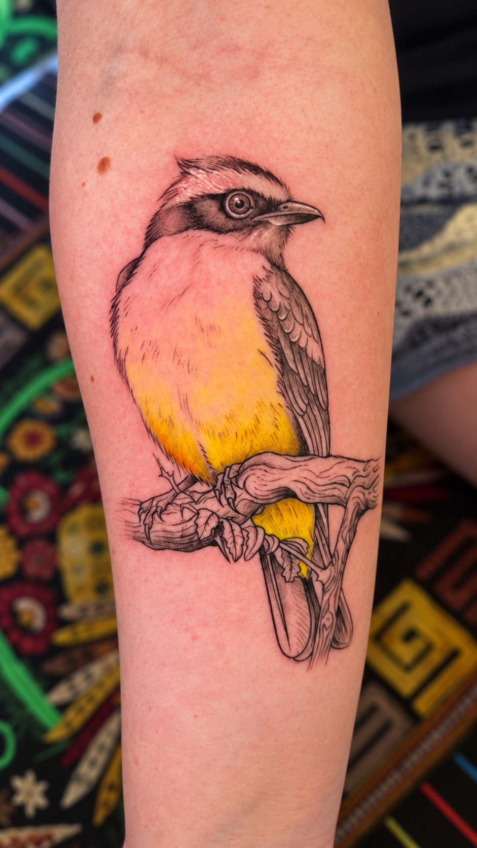 Yellow bird tattoo by Fuego Sagrado